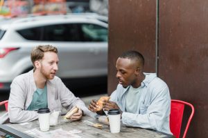 Two friends talking about gay therapy